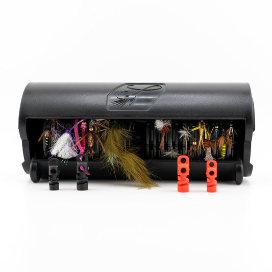 Black QuickDrift™ with various colorful fly fishing lures on a white background